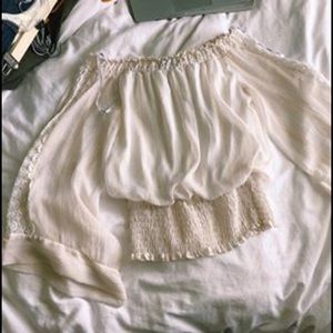 white/gold shimmery off-shoulder bell sleeve top